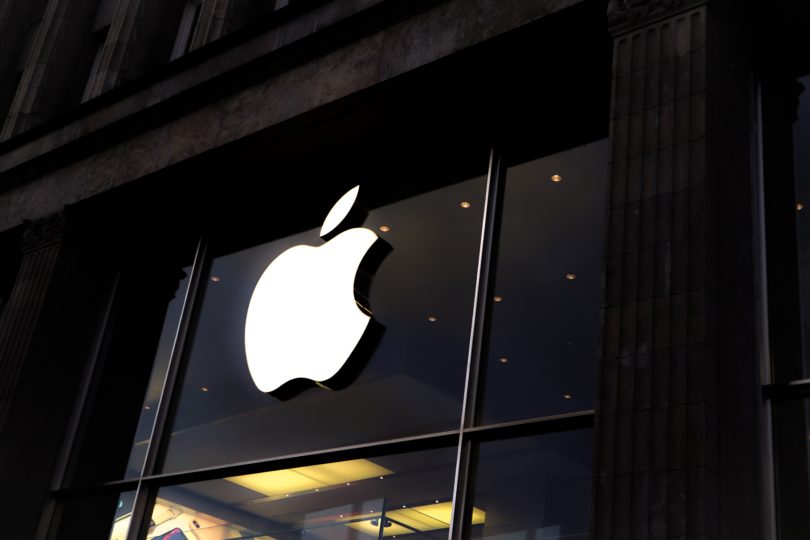 Lit up Apple logo on the side of a building - The Apple Tax Appeal